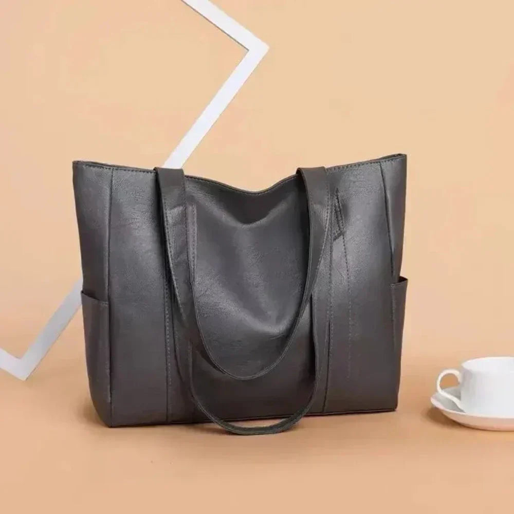 Lucia — Geantă de mână minimalistă elegantă