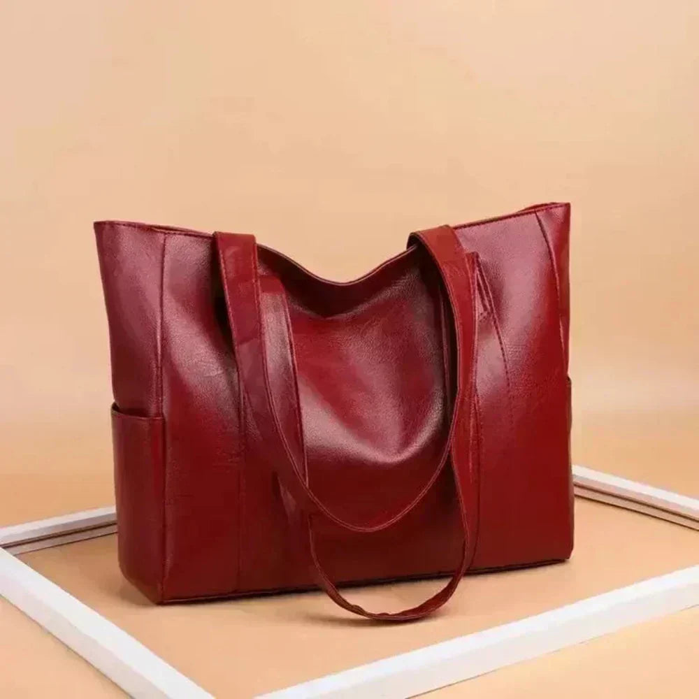 Lucia — Geantă de mână minimalistă elegantă
